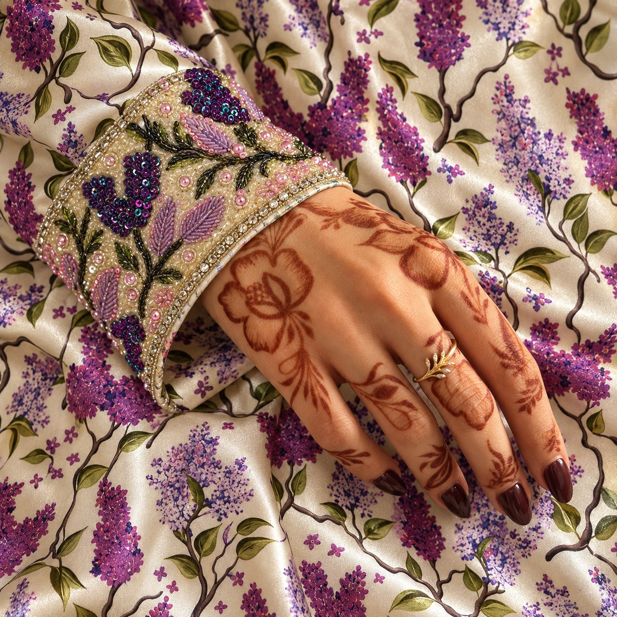 Close-up of the Lilac cuff with sequinned lilac clusters and beaded leaves